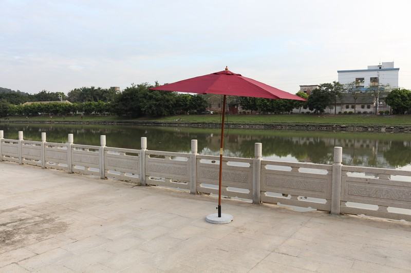 How can a sun umbrella be designed to withstand strong winds?(pic1)
